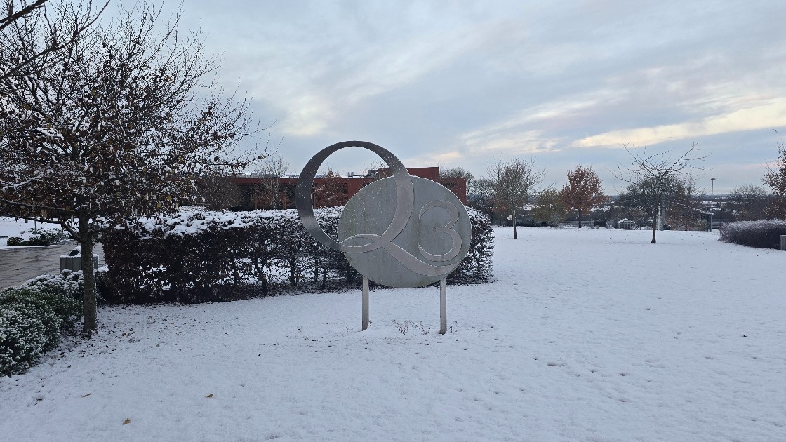 Academy sign with a snowy backdrop